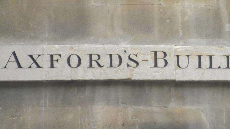Axfords Buildings sign before restoration